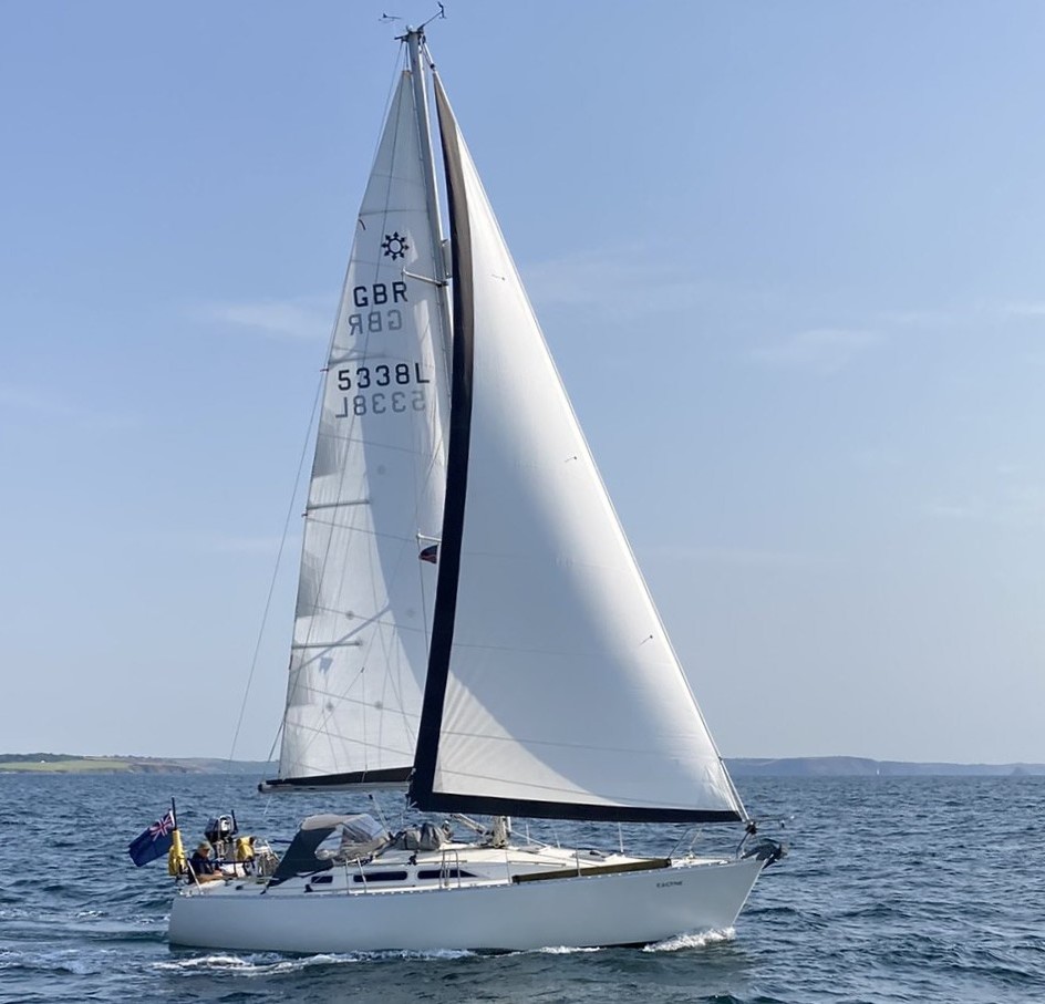 A photograph of Ragtime under sail off Falmouth